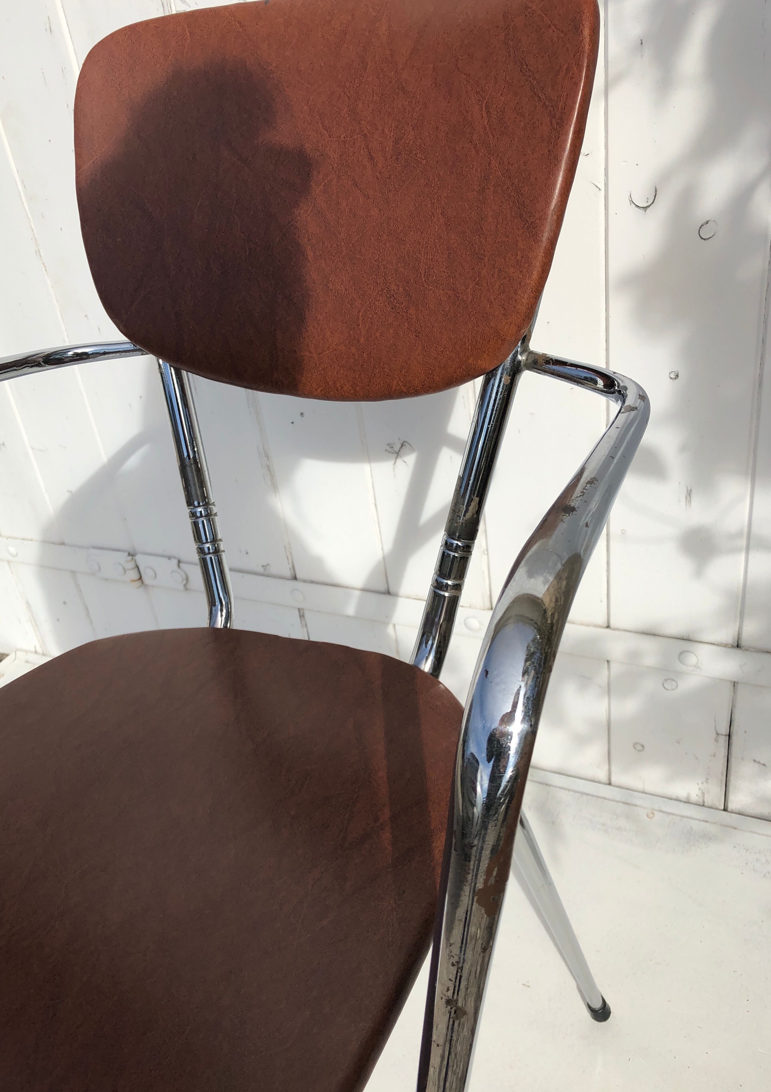 Vintage chair with armrests