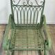 Rocking-chair en fer forgé vert patiné