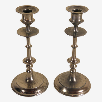 Pair of candlesticks in silver metal