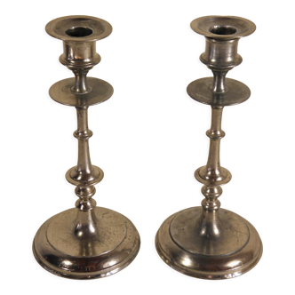 Pair of candlesticks in silver metal