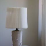 Modern vintage French table lamp, made of stone with fish patterns, 1970s.