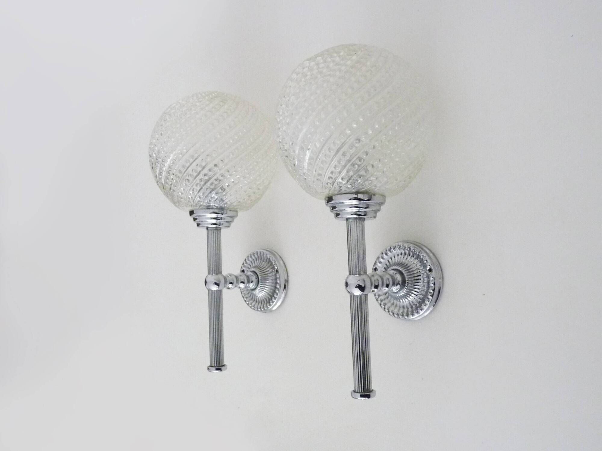 Pair of vintage Karl Lenz wall sconces. Chrome-plated metal and glass