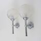 Pair of vintage Karl Lenz wall sconces. Chrome-plated metal and glass