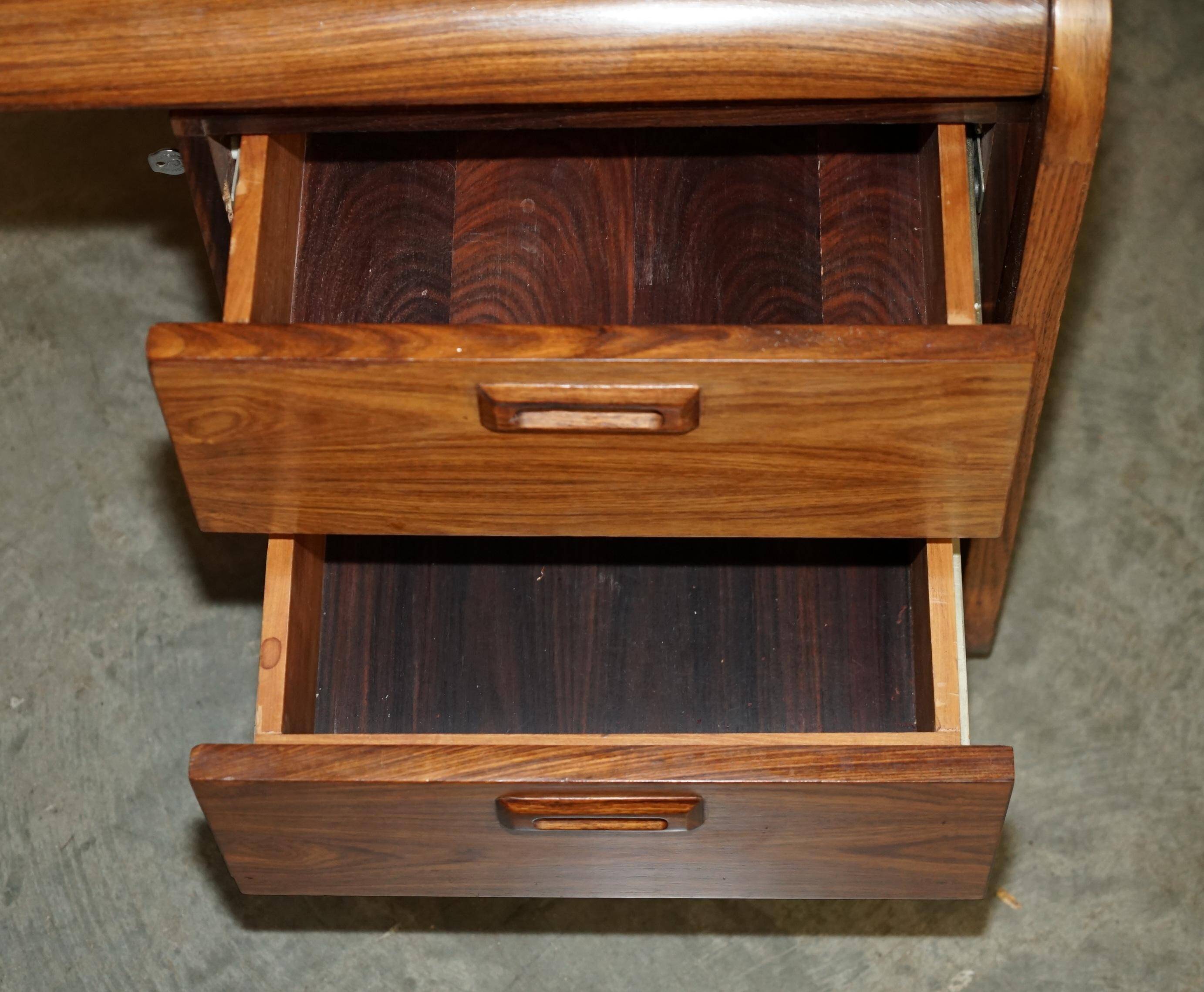 Mid-century modern right-angle desk in Brazilian wood.
