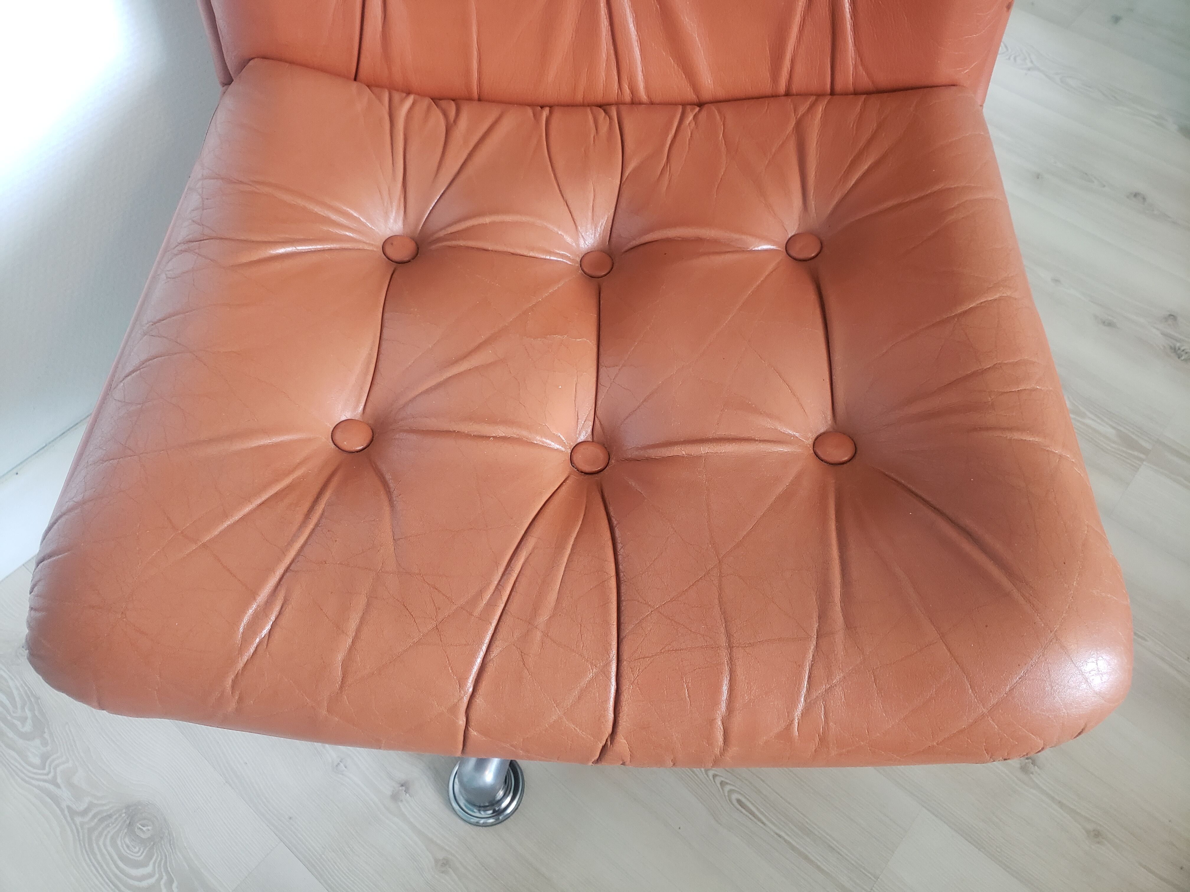 Vintage armchair in brown leather