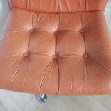 Vintage armchair in brown leather