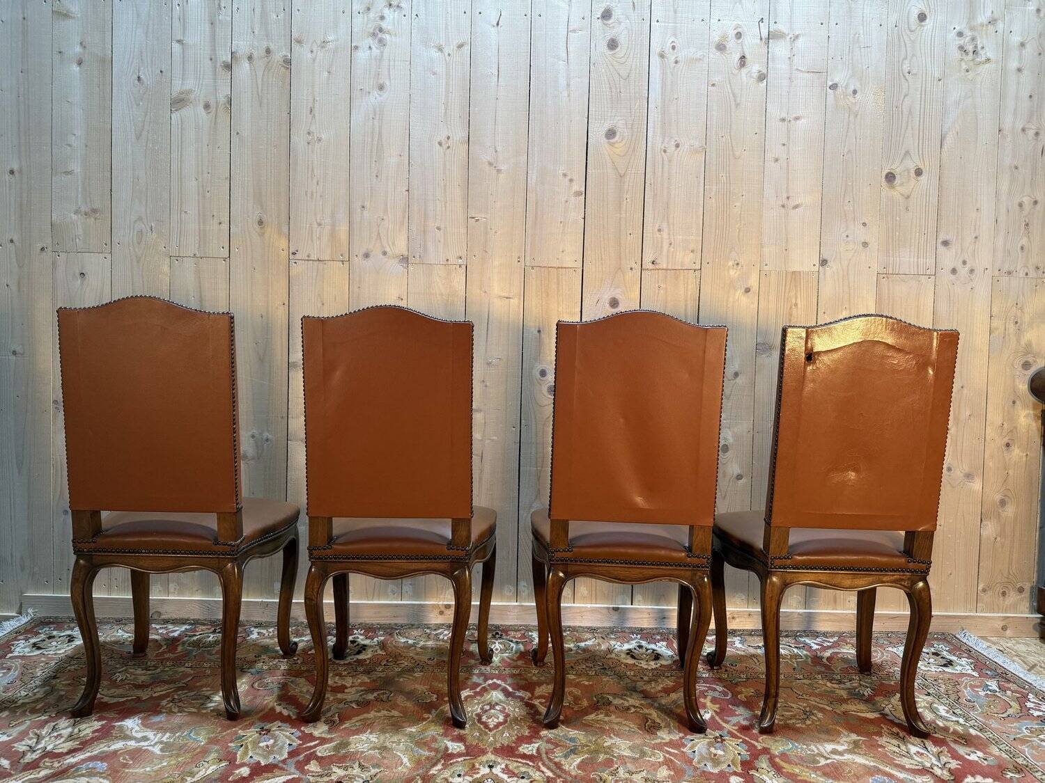 Set of 4 Louis XV style chairs in leather.