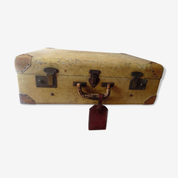Old suitcase, wood and skin