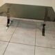 Table basse en métal chromé et verre fumé 1970
