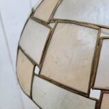 Suspension in mother-of-pearl and brass