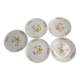 Porcelain flat plates with floral decoration