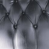 Black leather rocking Chesterfield armchair