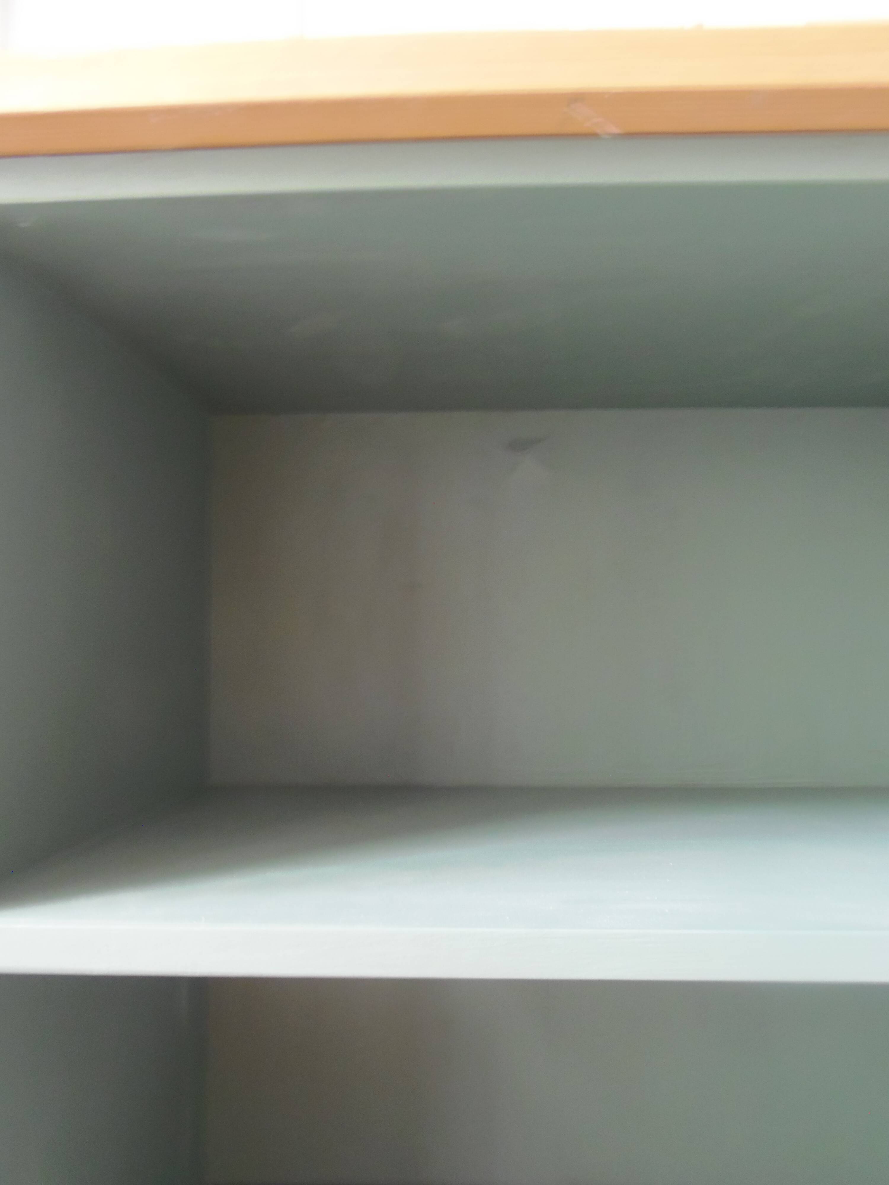 Small vintage bookcase enhanced in smoky green