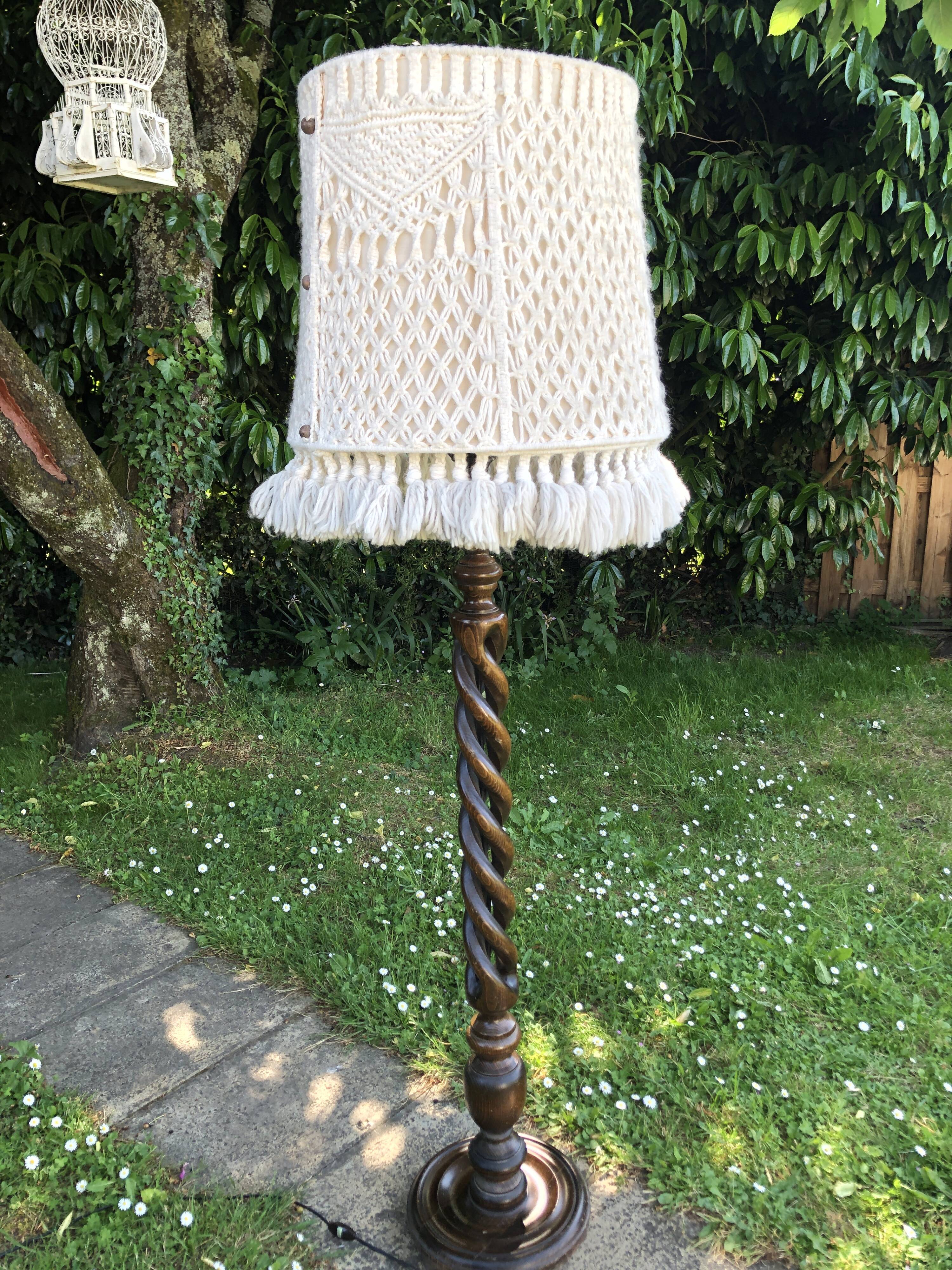 Dark turned wooden floor lamp and wool lampshade