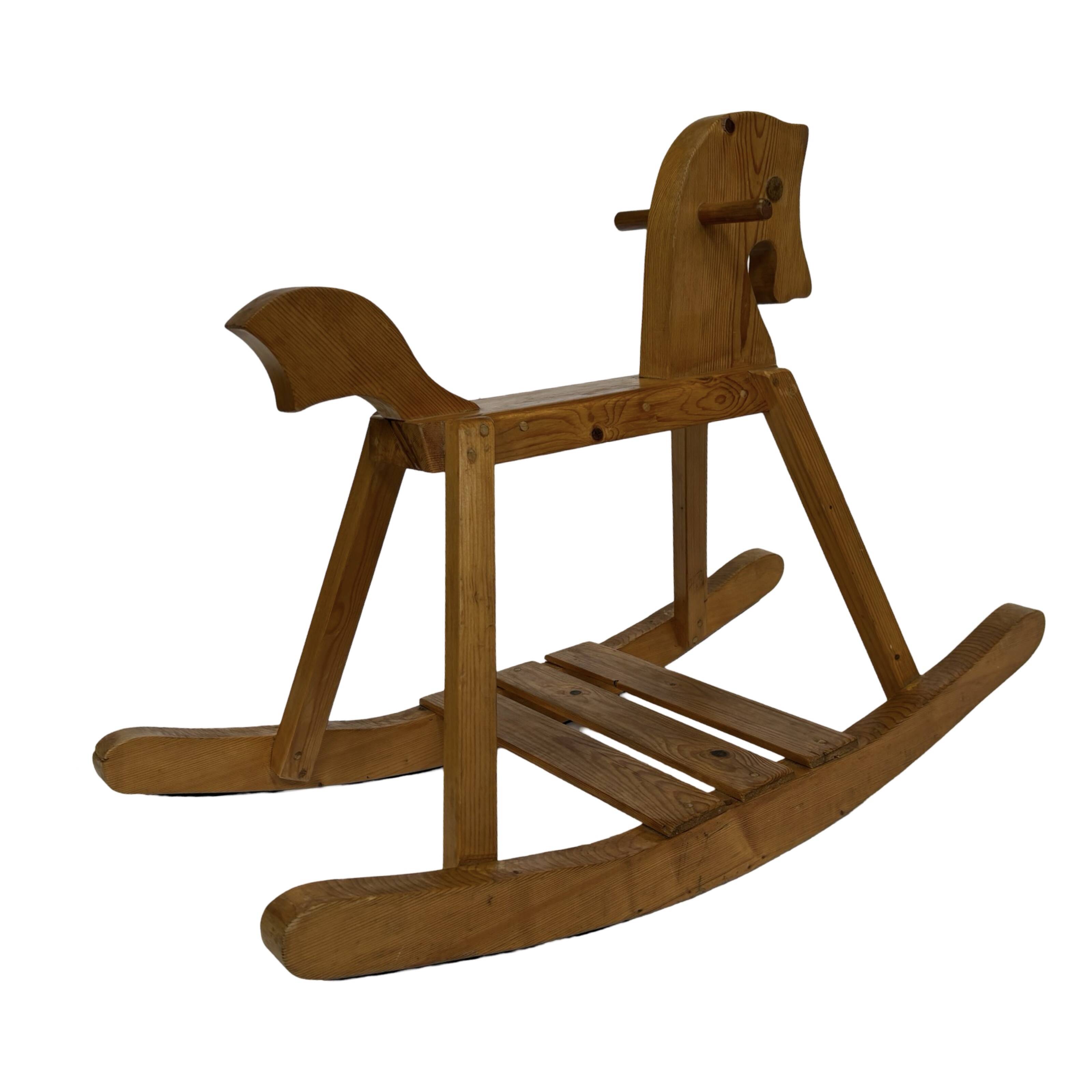 Vintage rocking horse 60s pinewood design minimalist design
