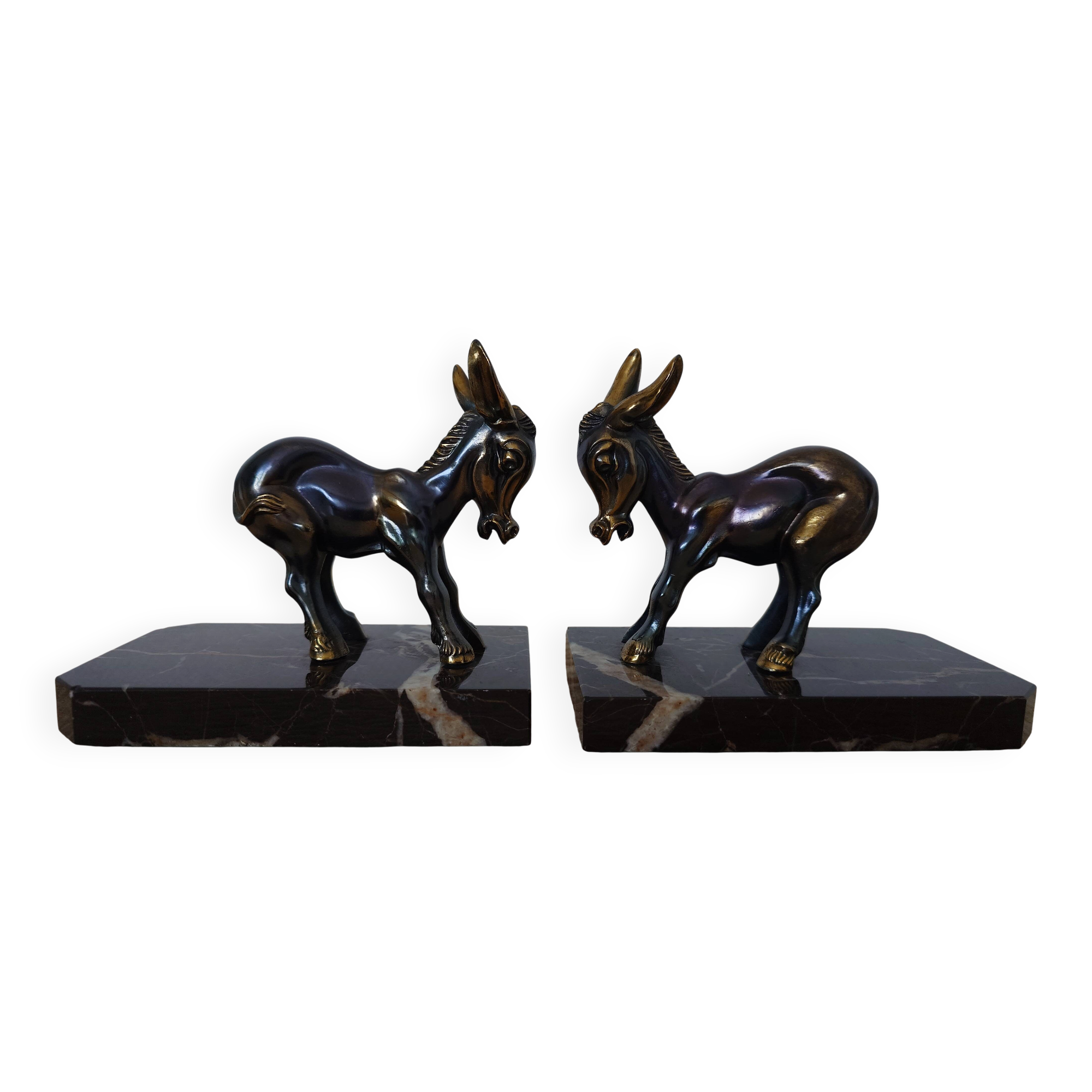 Bookends in the style of stylised donkeys, patinated metal and marble - circa 1940-1950.