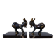 Bookends in the style of stylised donkeys, patinated metal and marble - circa 1940-1950.
