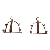 Pair of wrought iron wall sconces in medieval style
