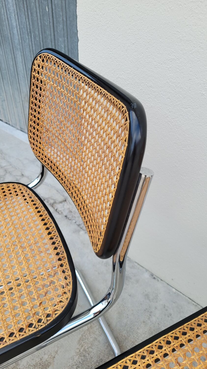 Pair of chairs by Marcel Breuer in black canework model B32 signed Italy