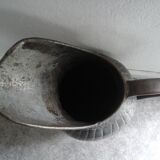 Old metal pitcher vase