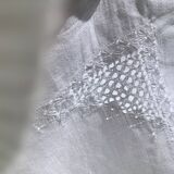 Rectangular tablecloth with embroidered openwork pattern