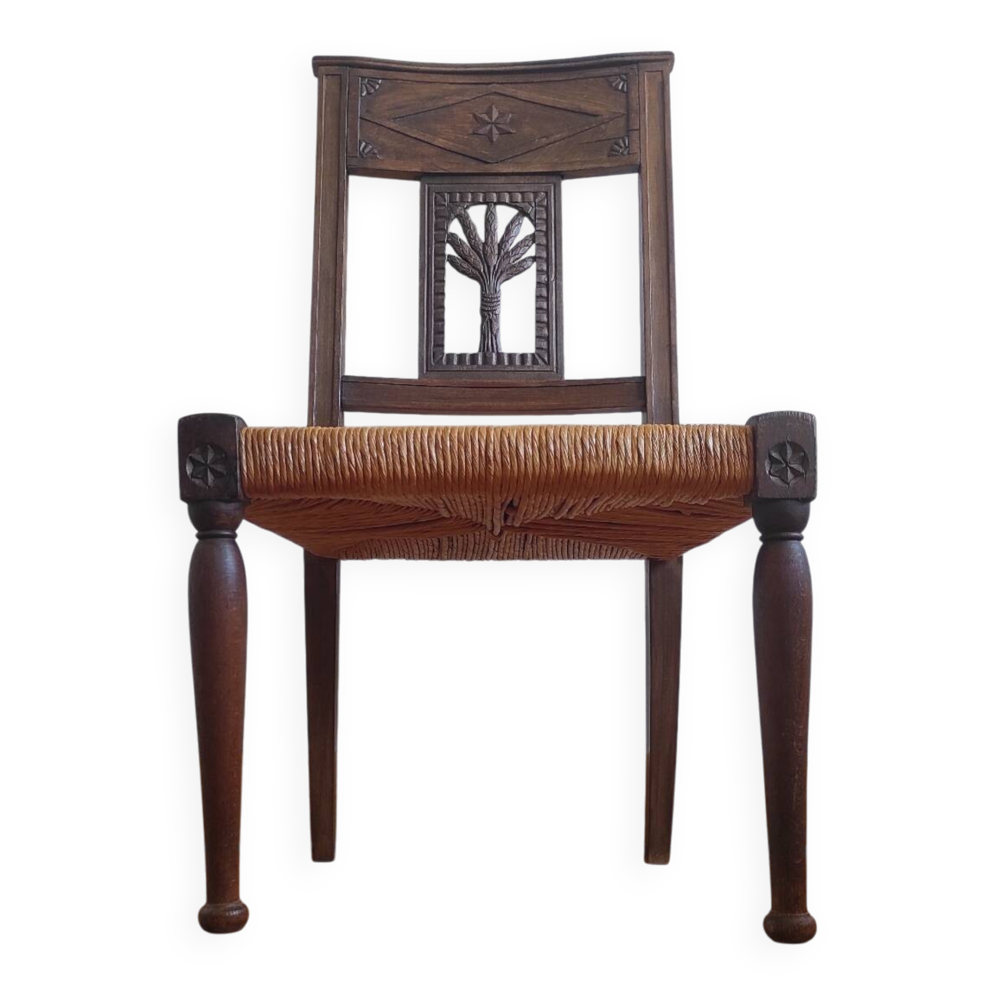 Armchair, low carved chair from the 19th century - decorated with wheat ears.
