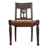 Armchair, low carved chair from the 19th century - decorated with wheat ears.