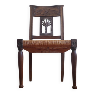 Armchair, low carved chair from the 19th century - decorated with wheat ears.