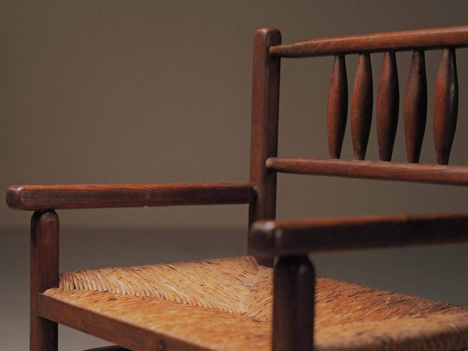 Wicker armchair in solid wood, handcrafted, France, around 1950.