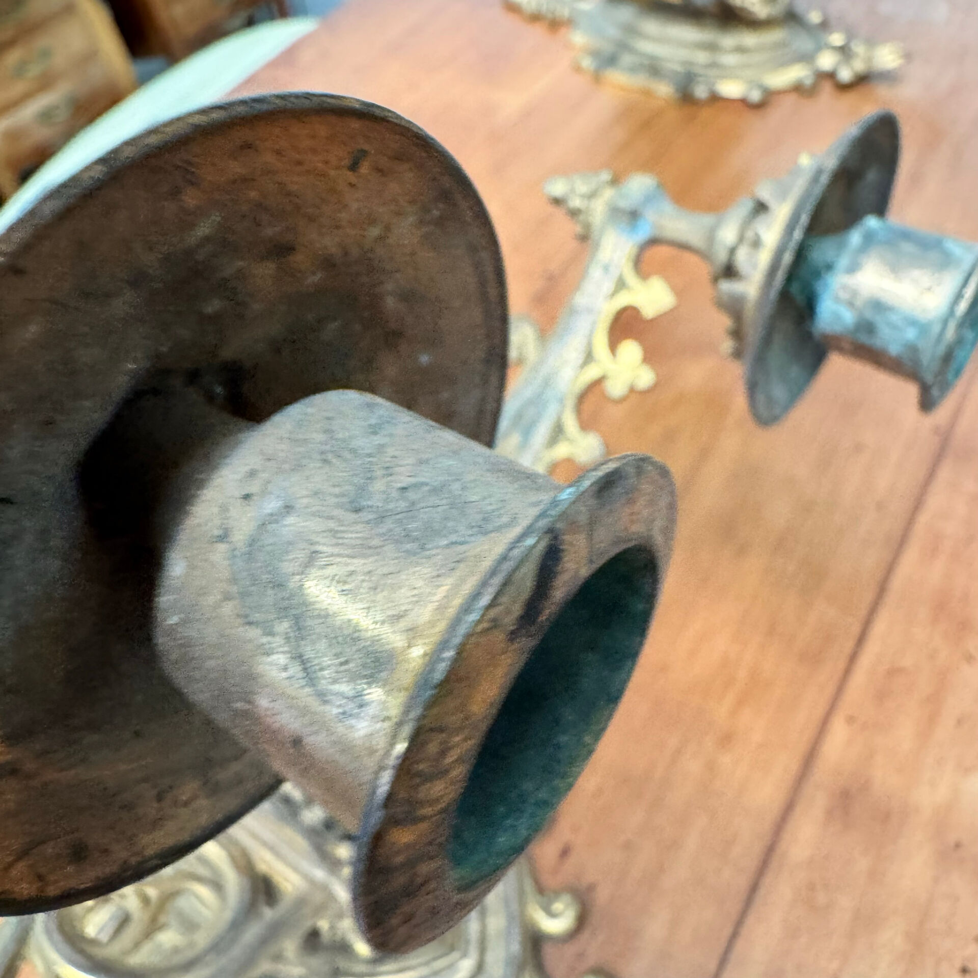 Elegant pair of three-light wall sconces from the 19th century.
