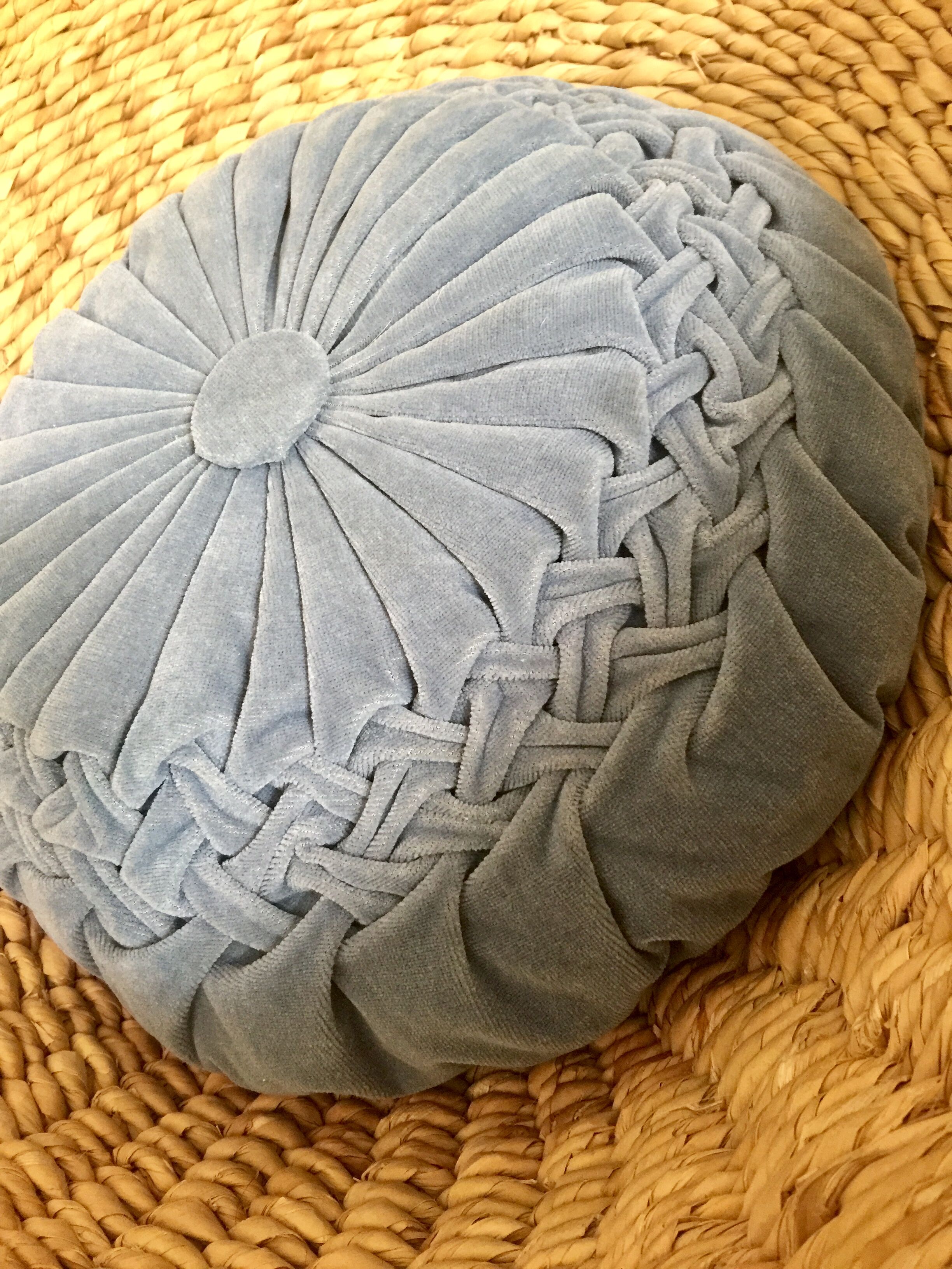Blue pleated round cushion