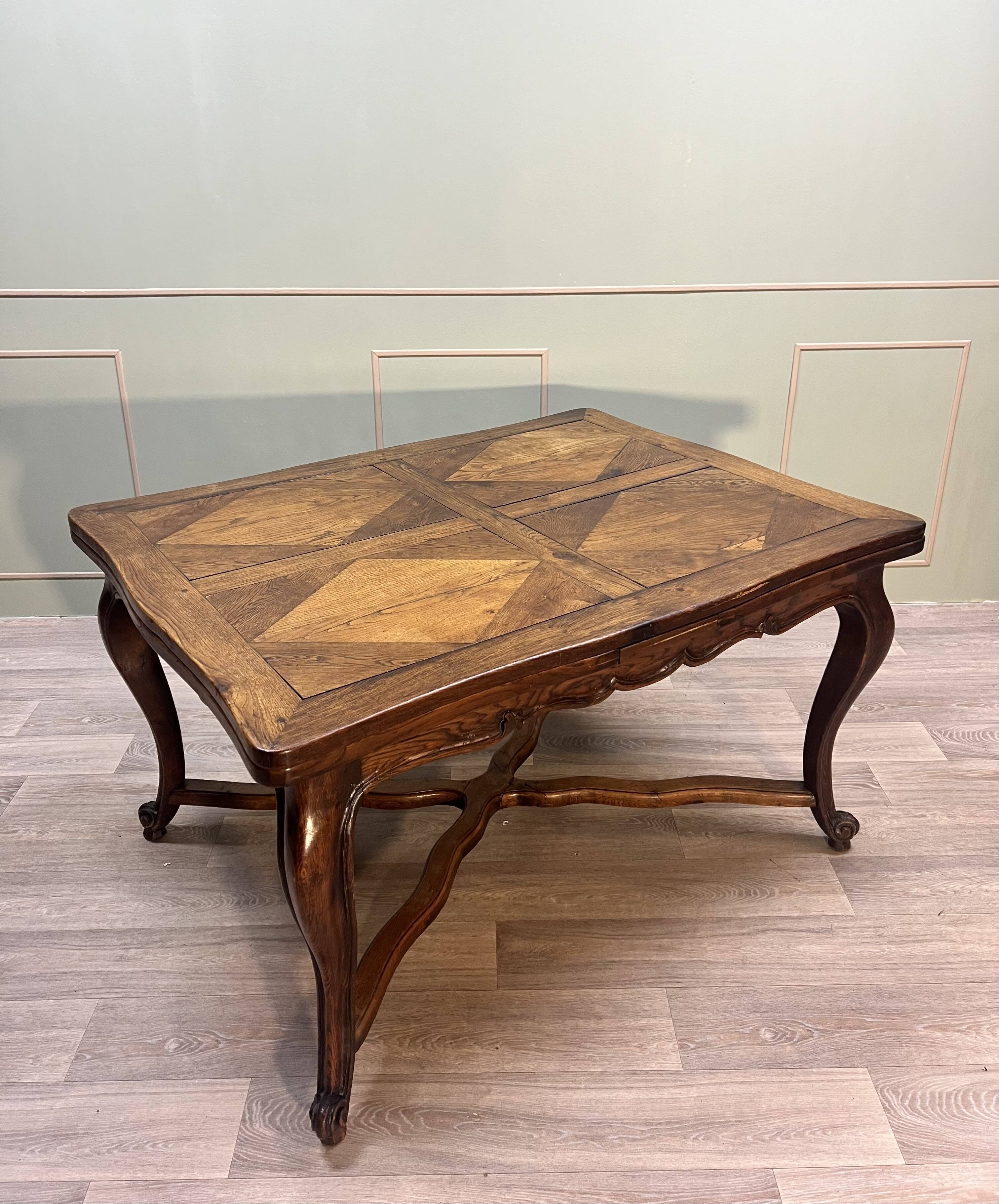 Dining room table in natural wood called italian style with parquet top 19th century