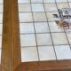 Vintage extendable dining table in wood and ceramic – 1970s