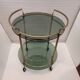 Table d'appoint / barcart / serveuse milieu de siècle, laiton doré et verre fumé, années 70 - Italie.