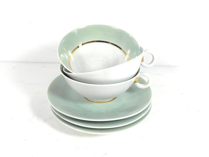 White porcelain and mint cups and saucers, half a cup
