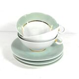 White porcelain and mint cups and saucers, half a cup