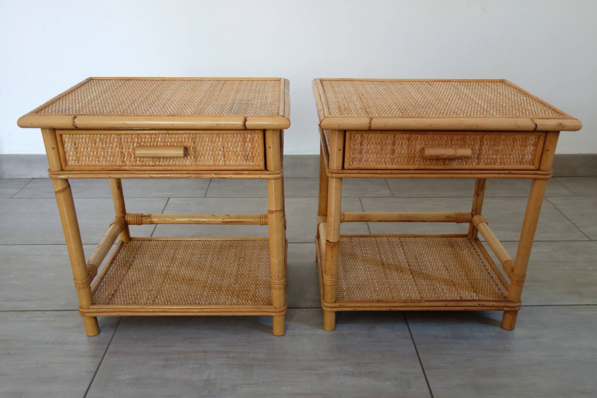 Pair of woven wicker and bamboo bedside tables, 70s/80s.
