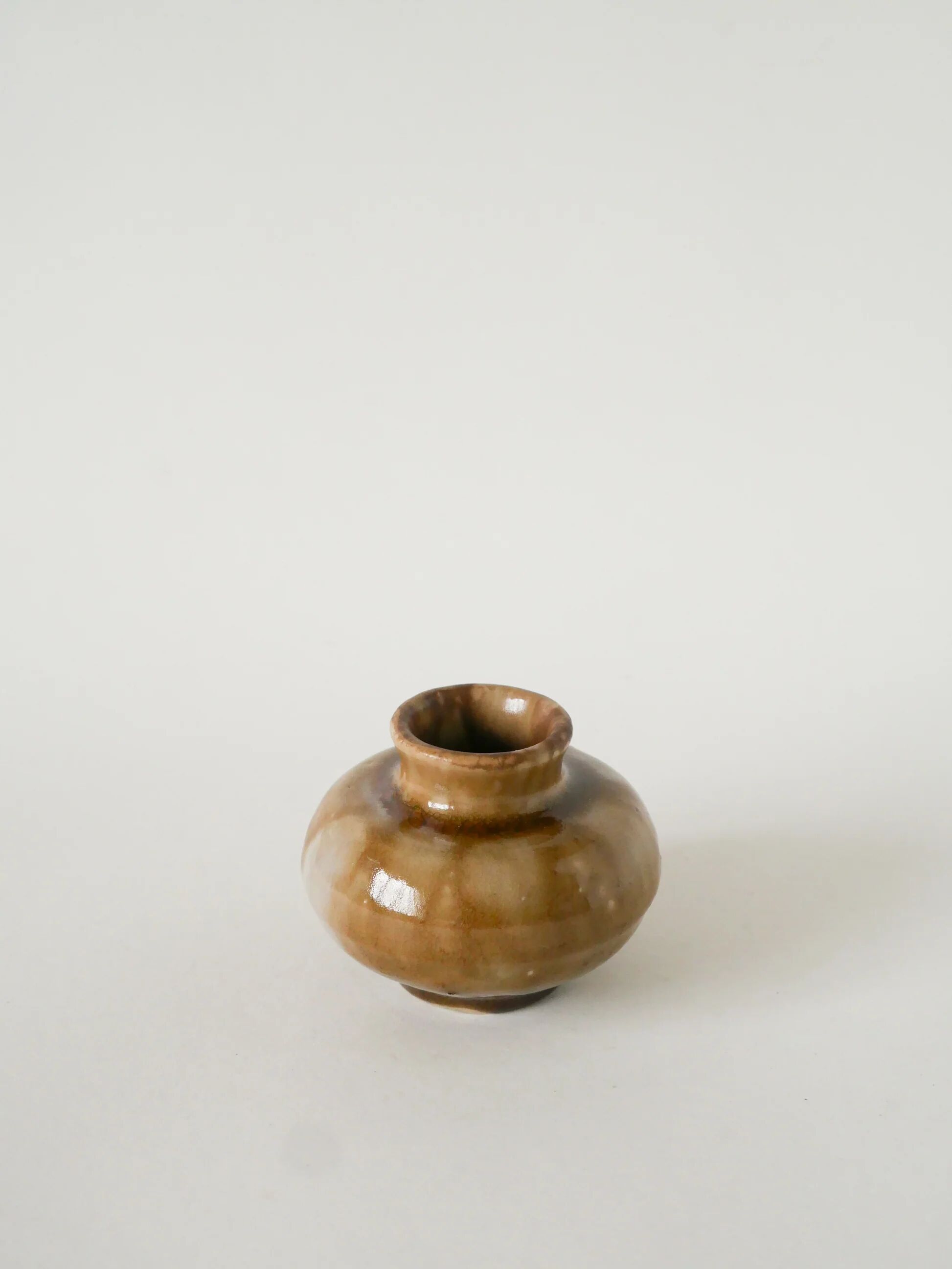 Small ceramic vase, light brown, 1970.