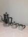 coffee maker, sugar bowl and iron milk jar