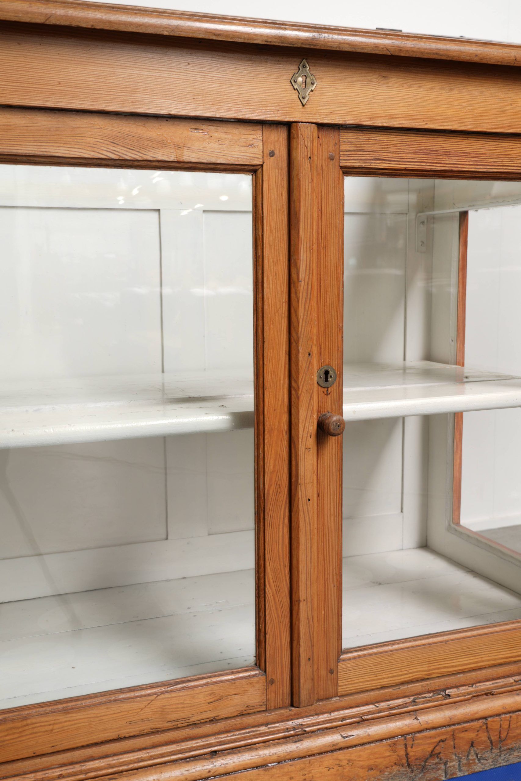 Vintage shop/museum display cabinet with shelves, doors and an opening top