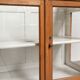Vintage shop/museum display cabinet with shelves, doors and an opening top