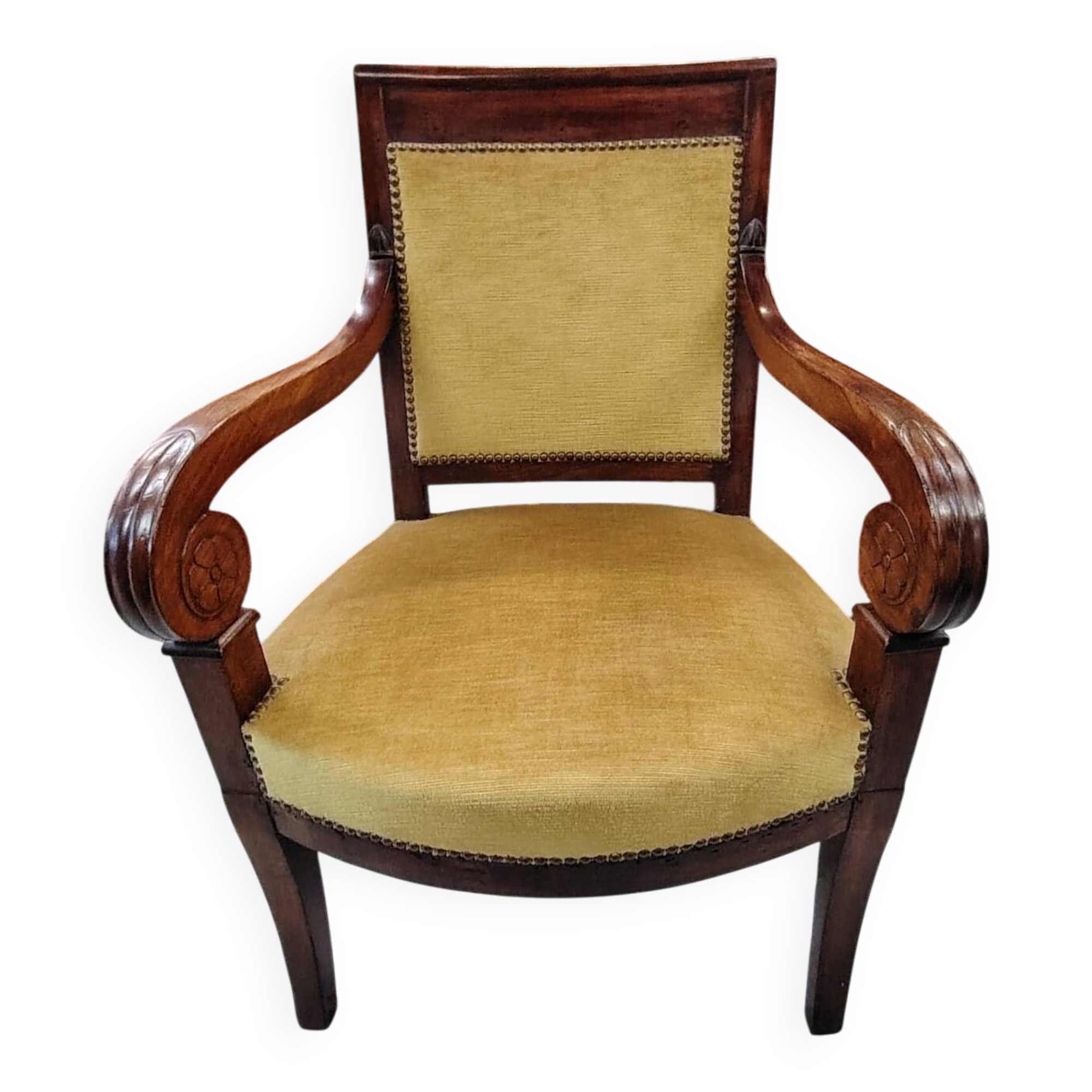 Armchair with scroll arms and sabre legs in mustard velvet, 19th century.