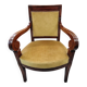 Armchair with scroll arms and sabre legs in mustard velvet, 19th century.