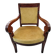 Armchair with scroll arms and sabre legs in mustard velvet, 19th century.