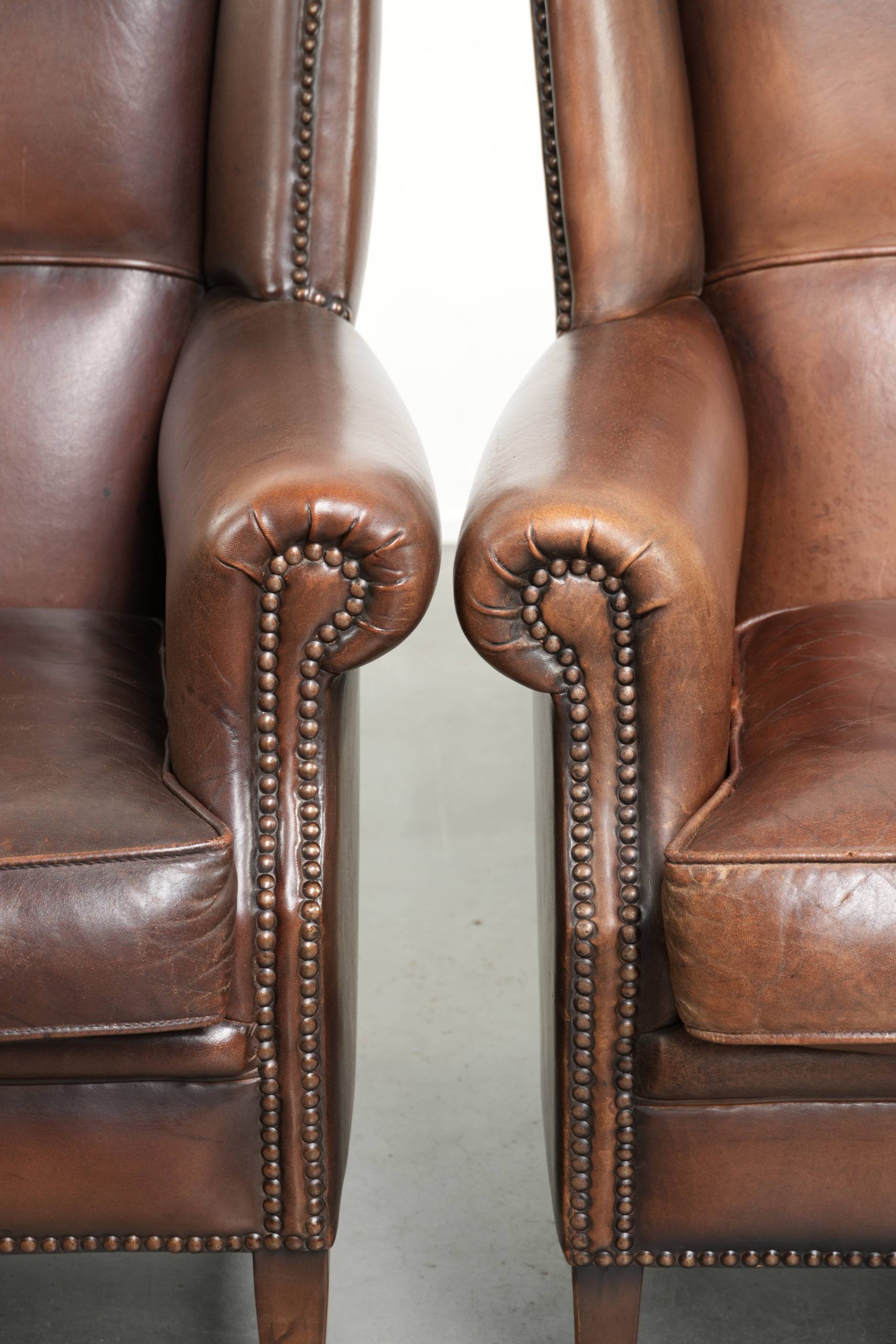 Set of 2 subtle sheepskin wingback armchairs in English style