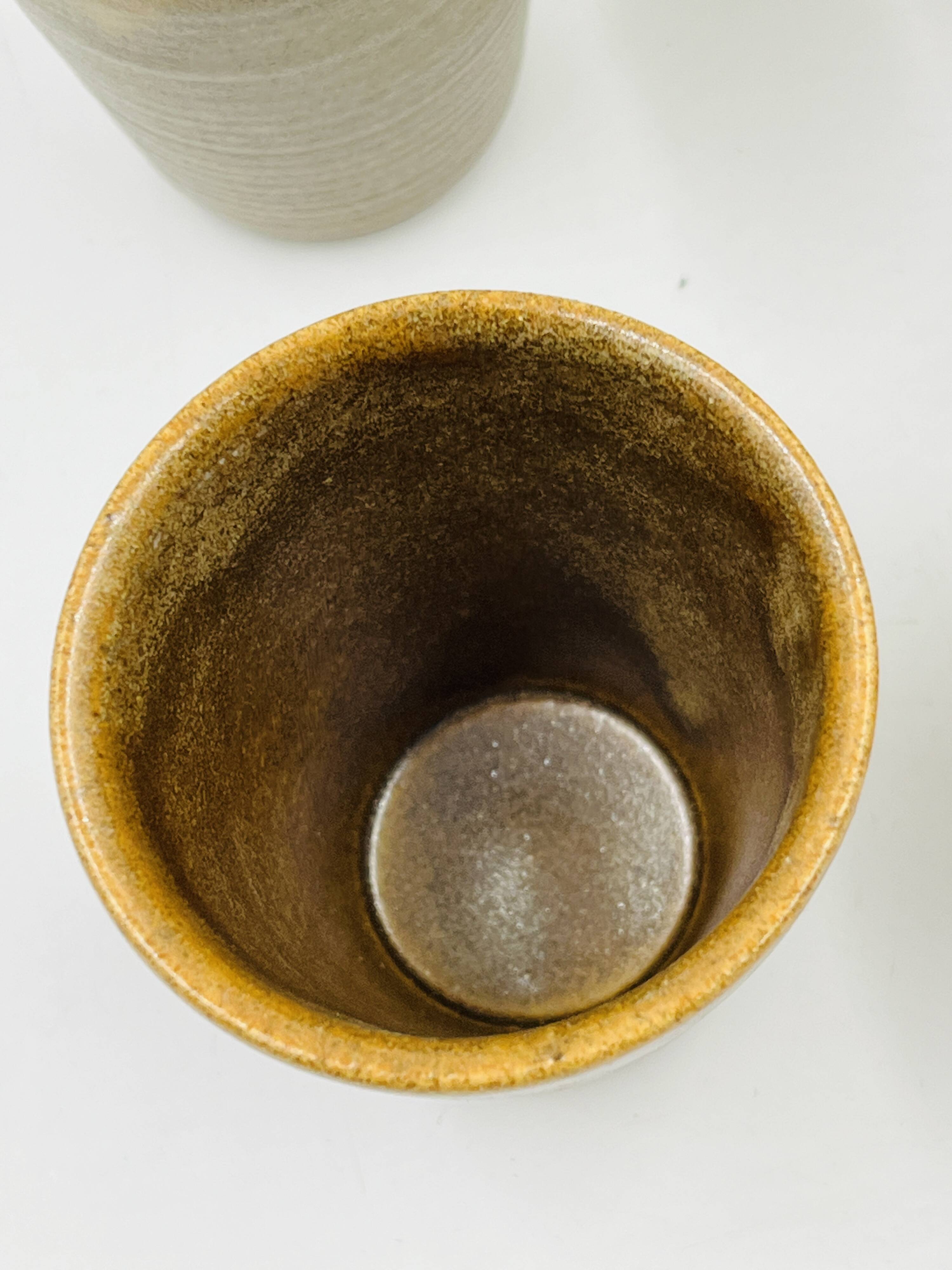 Set of six vintage Digoin stoneware cups.