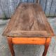 Antique solid cherry farmhouse table with 3 drawers and 2 pulls