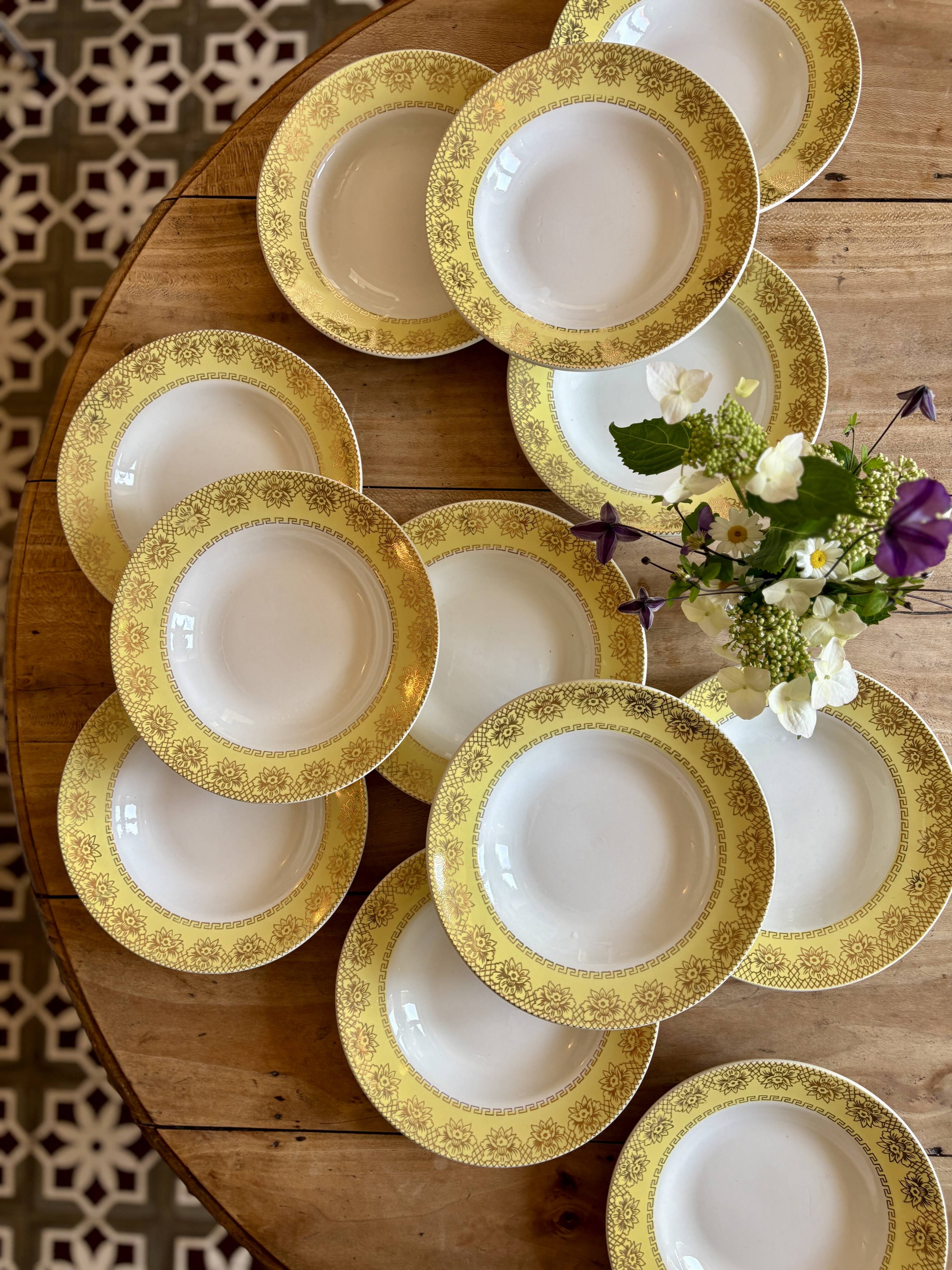 Set of 12 vintage yellow, white and gold soup plates