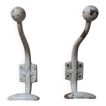 Two vintage coat hooks