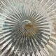 Vintage 1970s round wall light ceiling fixture with transparent glass.